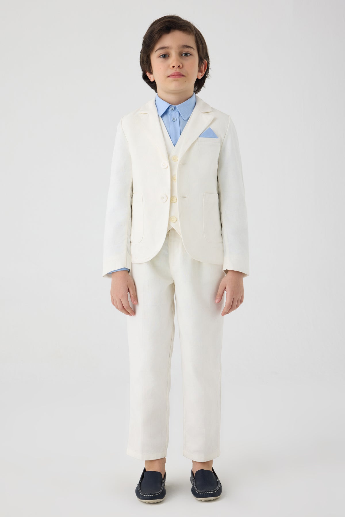 سترة بيضاء للأولاد